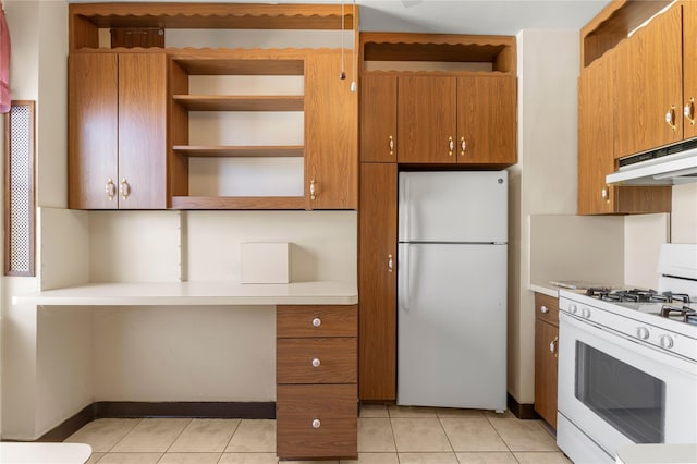 kitchen featuring white appliances and light tile patterned floors