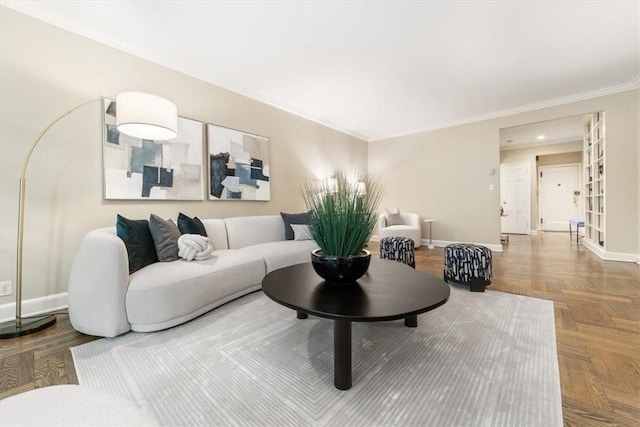 living room featuring crown molding and parquet flooring