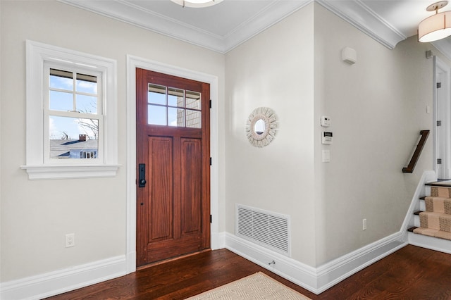 entrance foyer featuring stairs, visible vents, dark wood finished floors, and crown molding