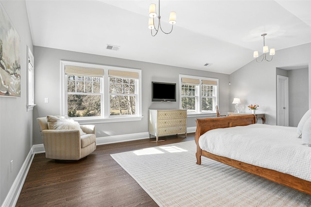 bedroom featuring baseboards, visible vents, an inviting chandelier, dark wood-type flooring, and vaulted ceiling