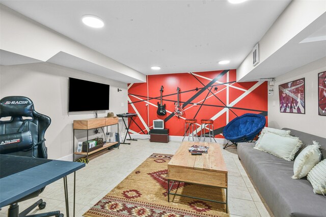 tiled living area featuring recessed lighting, visible vents, and baseboards