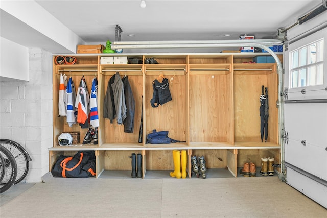 garage with concrete block wall