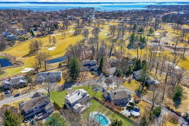 aerial view with a residential view and a water view