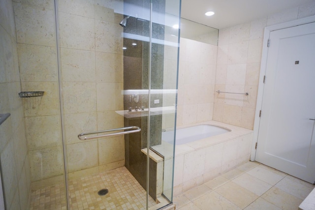 bathroom featuring plus walk in shower