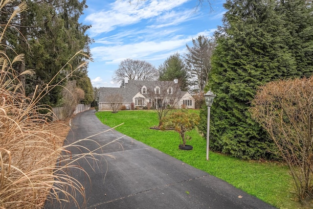 view of front of home with a front yard