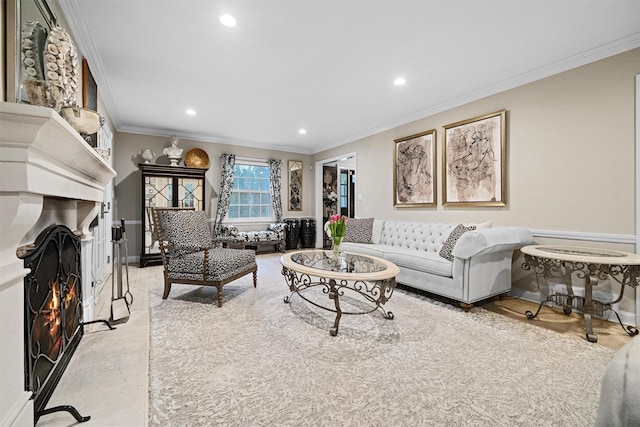 living room featuring crown molding and a fireplace