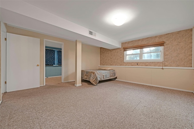 unfurnished bedroom with carpet floors