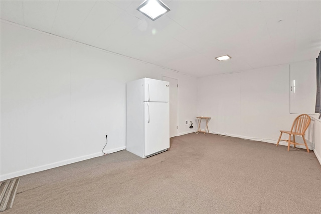 unfurnished room featuring carpet