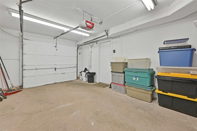 garage featuring a garage door opener