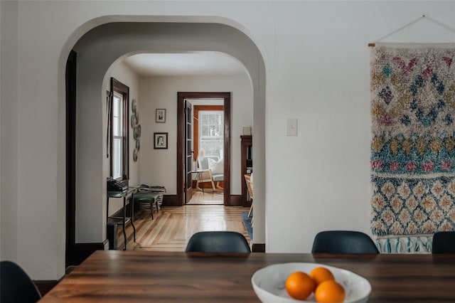 dining area with light parquet floors