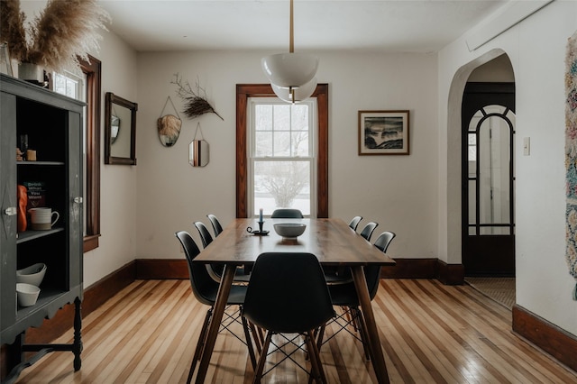 dining area with light wood-type flooring