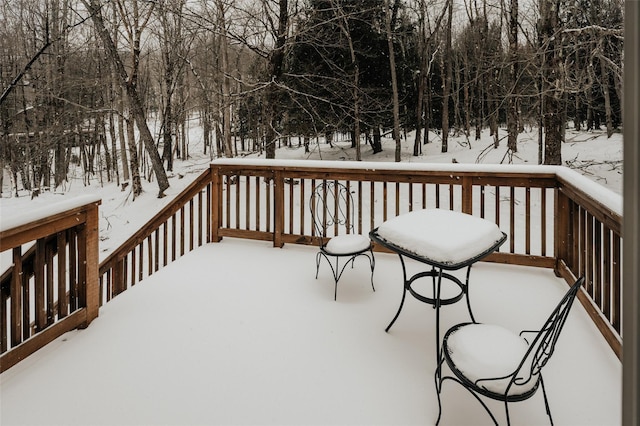 view of snow covered deck