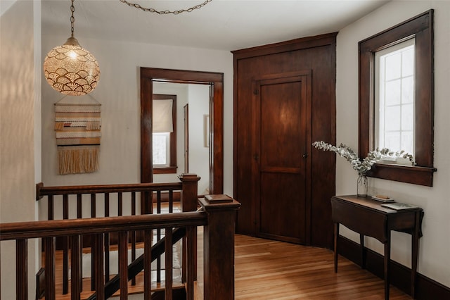 hall with light wood-type flooring