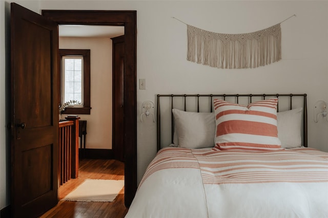 bedroom featuring hardwood / wood-style floors