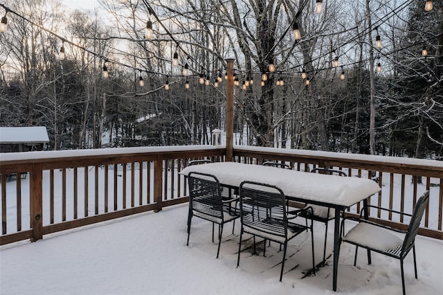 view of snow covered deck