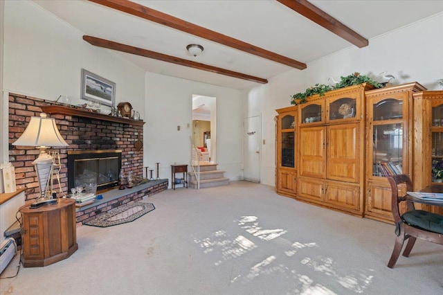 carpeted living room with beamed ceiling and a fireplace