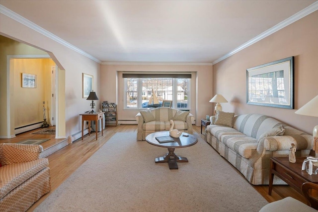 living room with ornamental molding, hardwood / wood-style flooring, and a baseboard heating unit