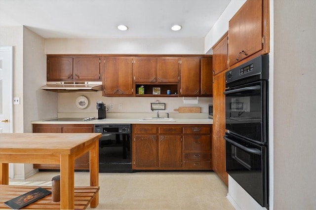 kitchen with black appliances and sink