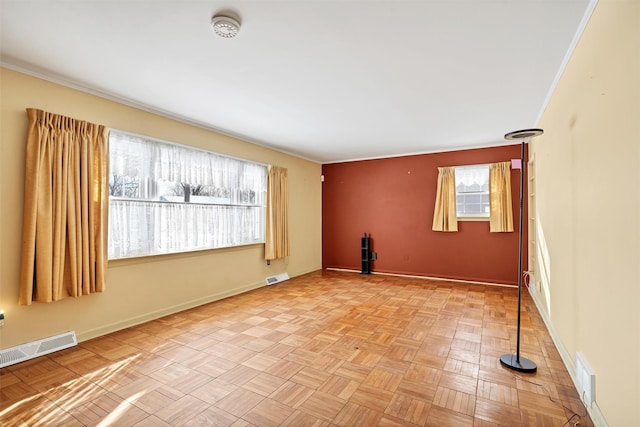 empty room featuring light parquet flooring