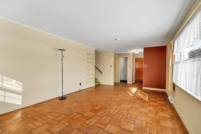 empty room featuring light parquet flooring