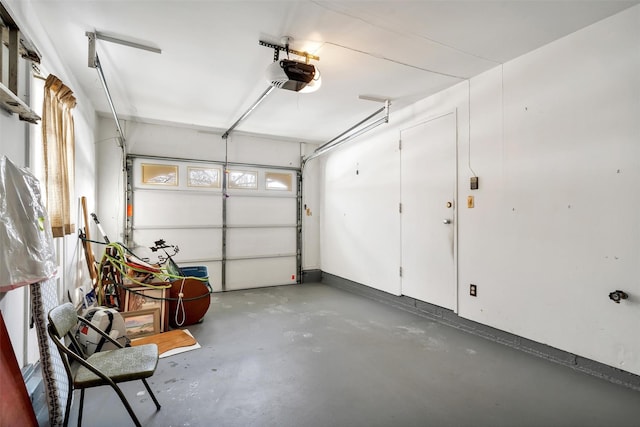 garage featuring a garage door opener