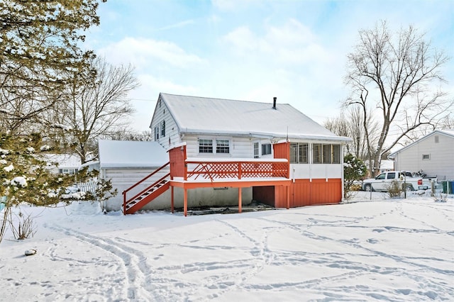 view of front of home with a deck