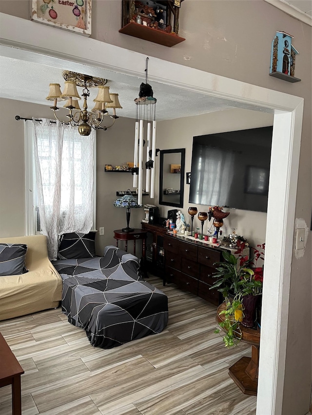 living room with an inviting chandelier