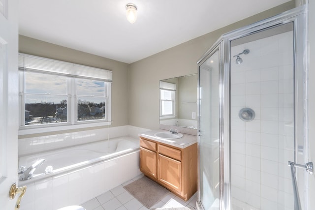 bathroom featuring vanity, tile patterned floors, and independent shower and bath