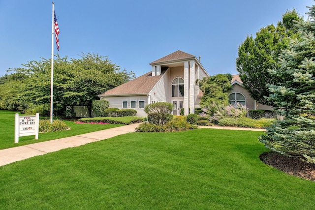 view of front of home with a front yard