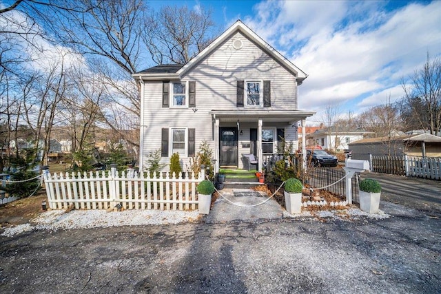 front of property featuring covered porch