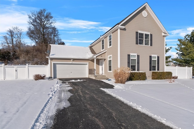 front of property featuring a garage