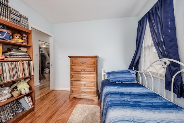 bedroom with light hardwood / wood-style floors