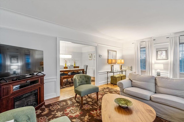 living room with light hardwood / wood-style flooring