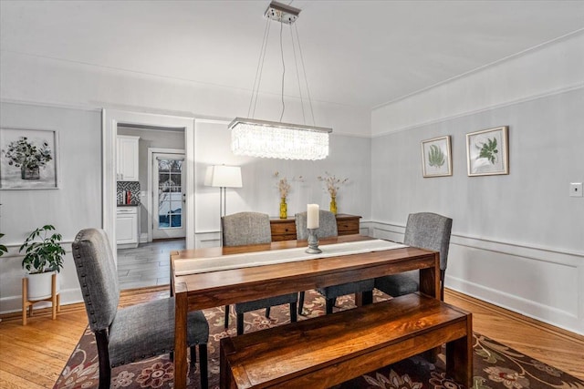 dining room featuring wood-type flooring