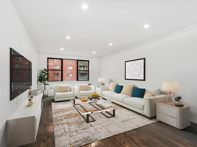 living room featuring dark wood-type flooring and crown molding