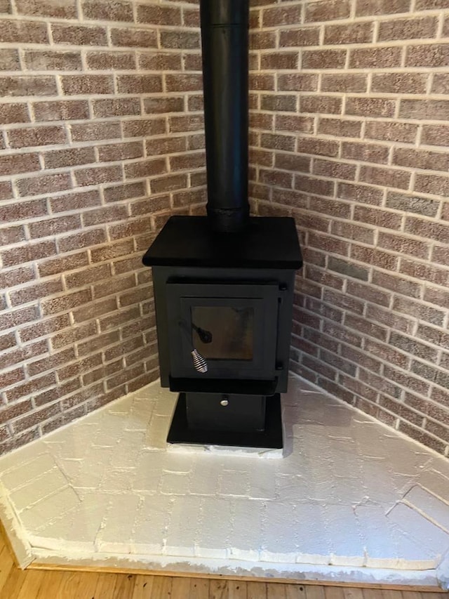 1139 State Route 17b, Mongaup Valley, NY 12762 - detailed view of a wood stove and brick wall