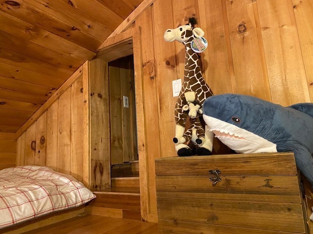 1139 State Route 17b, Mongaup Valley, NY 12762 - bedroom featuring lofted ceiling, wooden ceiling, wooden walls, and wood finished floors