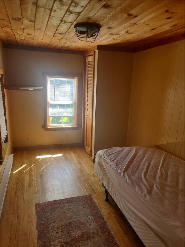 1139 State Route 17b, Mongaup Valley, NY 12762 - bedroom with hardwood / wood-style flooring, wood ceiling, and wood walls