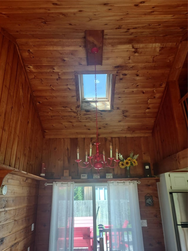 1139 State Route 17b, Mongaup Valley, NY 12762 - detailed view of wood walls, wooden ceiling, a chandelier, and freestanding refrigerator