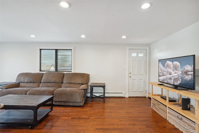 living room with dark wood-type flooring and a baseboard radiator