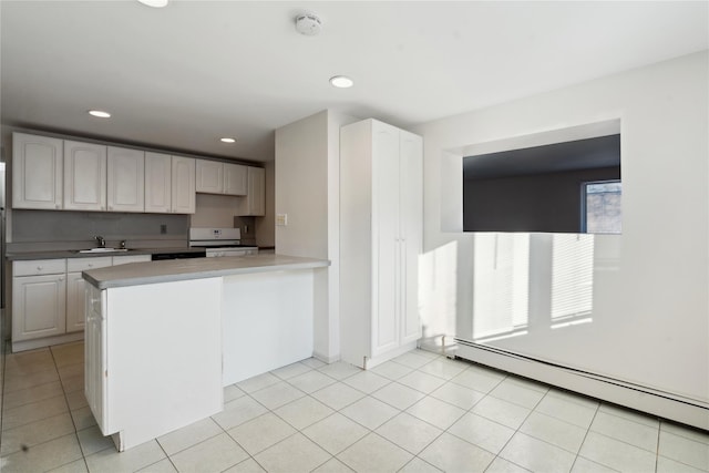 kitchen with white cabinetry, kitchen peninsula, white range oven, a baseboard radiator, and sink