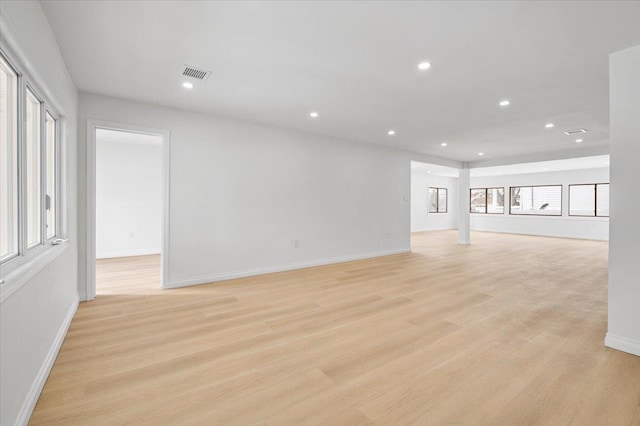 empty room with light wood-type flooring