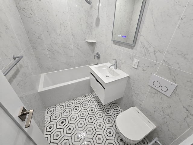 full bathroom featuring toilet, vanity, tub / shower combination, and tile patterned flooring