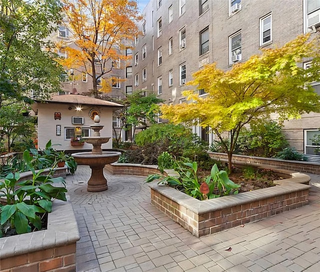 view of community with a patio