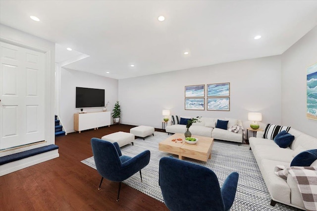 living area featuring dark wood-style floors and recessed lighting