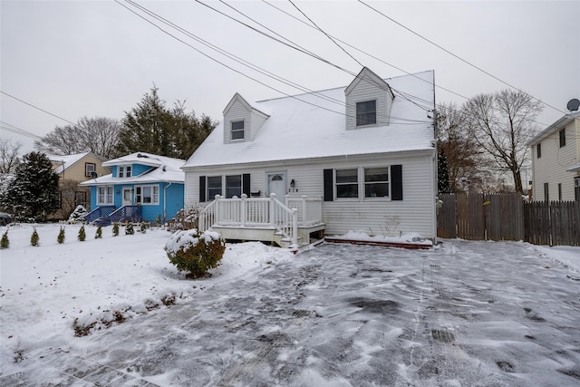 view of new england style home