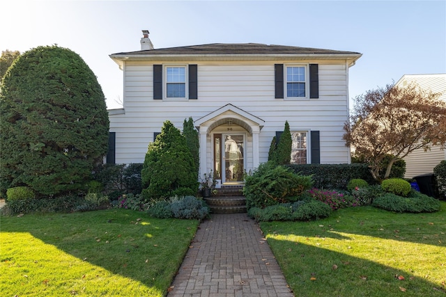 view of front of house with a front yard