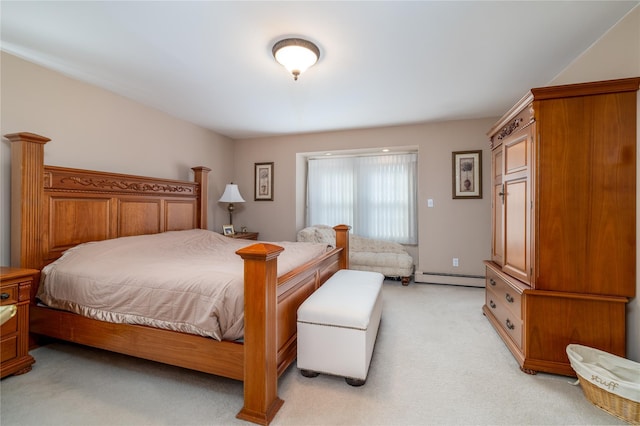 bedroom featuring baseboard heating and light carpet