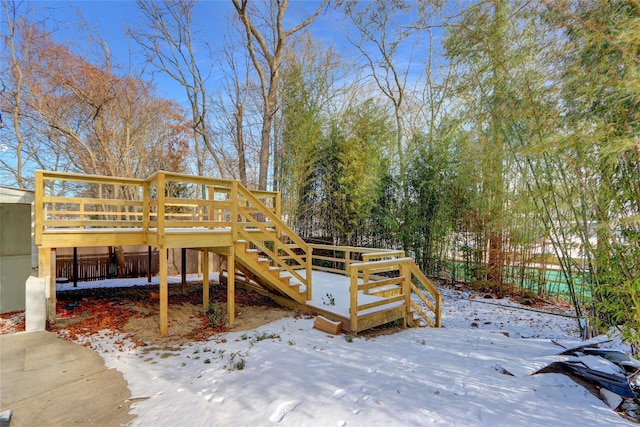 view of snow covered deck