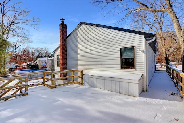 view of snow covered property